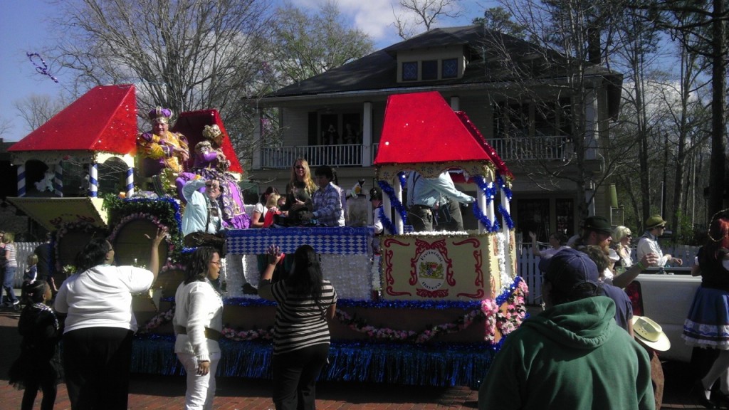 2012 Mardi Gras parade passes the Black Swan